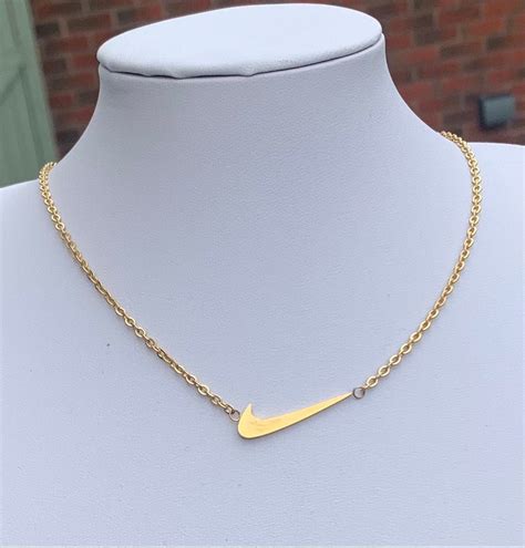 Nike kette gold 